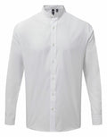 The Premier PR258 is a white long-sleeve shirt featuring a button-up front and a mandarin collar.