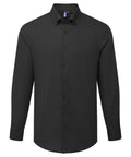 A plain black long-sleeve shirt with a collar and buttoned cuffs, button-up front, displayed on a white background.