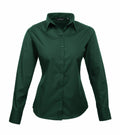The Premier PR300 is a long-sleeved, dark green button-up shirt showcased against a white background. It features a classic collar and tailored fit, with buttons running down the front.