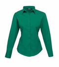A green long-sleeved PR300 button-up shirt from Premier, featuring a collar and displayed against a white background. The shirt boasts a fitted design and simple cuffs.
