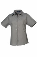 A PR302 shirt from Premier, featuring short sleeves and a gray button-up design with a collar, displayed against a white background.