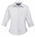 The Premier PR305 is a light gray, three-quarter sleeve button-up shirt with a collar, showcased against a white background.
