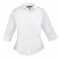 The Premier PR305 is a white button-up shirt with three-quarter sleeves and a pointed collar, designed for a tailored fit that accentuates a classic and professional style.