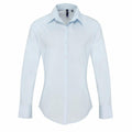 Premier PR307 is a light blue, long-sleeved button-up shirt, featuring a pointed collar and a fitted design.