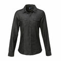 The Premier PR322 is a black long-sleeve button-up denim shirt featuring two chest pockets.