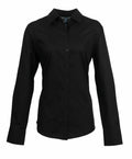 The Premier PR334 is a black button-up shirt featuring long sleeves and a classic collar.