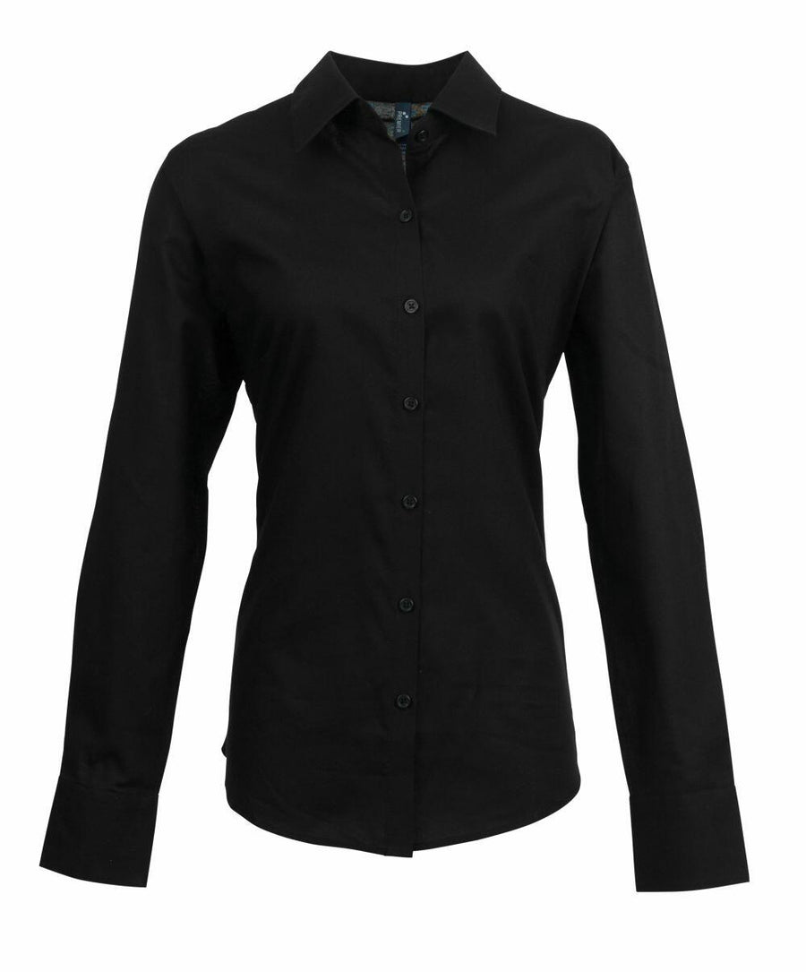 The Premier PR334 is a black button-up shirt featuring long sleeves and a classic collar.