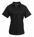 Premier's PR336 is a black short-sleeve button-up shirt featuring a collar, showcased on a white background.