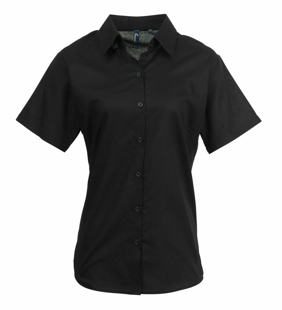 Premier's PR336 is a black short-sleeve button-up shirt featuring a collar, showcased on a white background.