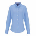 A Premier PR338 light blue long-sleeve button-up shirt set against a white background.