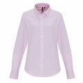 The Premier PR338 is a light pink button-up shirt featuring long sleeves and a collar. It boasts a subtle striped pattern, white buttons, and a slightly curved hem, all set against a white background.