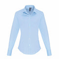 A light blue Premier PR344 long-sleeved button-up shirt with a pointed collar.