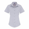 The Premier PR346 light gray short-sleeved button-up shirt, featuring a pointed collar, is displayed against a white background.