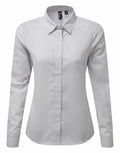 Introducing the PR352 by Premier: a long-sleeved, button-up shirt featuring a light gray and white gingham pattern. With its classic collar and fitted silhouette, this shirt is ideal for both casual and business casual settings.