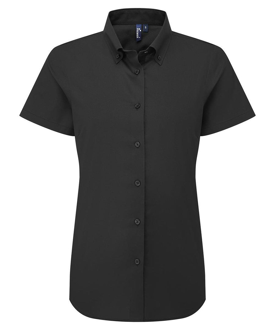 The Shirts product is a tailored, plain black short-sleeve button-up with a collar and classic design, displayed against a white background.