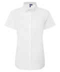 The Shirts product is a neatly pressed, classic, plain white short-sleeve button-up with a collar, displayed on a white background.