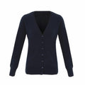 The PR402 by Premier is a navy blue cardigan featuring long sleeves, a V-neckline, and button closure down the front.