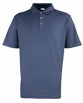 Premier's PR610 is a dark blue polo shirt featuring short sleeves and a three-button placket.