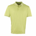 The Premier PR615 is a lime green polo shirt featuring a collar and three buttons at the top. It boasts short sleeves and a straightforward, plain design.