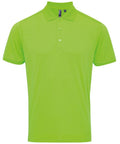 Premier's PR615 polo shirt is bright green, featuring short sleeves and a three-button placket, set against a plain white background.