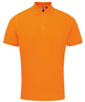 The PR615 by Premier is a bright orange polo shirt featuring short sleeves, a collar, and a buttoned placket, showcased against a white background.