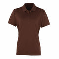 The Premier PR616 is a simple brown polo shirt featuring short sleeves, a collar, and a three-button placket on the front. It is displayed against a white background.