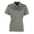 A plain gray short-sleeve polo shirt featuring a collar and three buttons down the front is displayed on a white background. The shirt is identified as PR616 by the brand Premier.