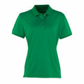The Premier PR616 is a green, short-sleeve polo shirt shown against a white background. It includes a classic collar and buttoned placket, offering a simple, casual style.