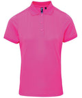 The Premier PR616 is a vibrant pink polo shirt featuring short sleeves, a three-button placket, and a collar. It is showcased on a plain white background.