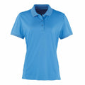 A Premier PR616 polo shirt in solid blue, featuring a collar and three buttons on the placket.