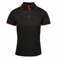 The Premier PR619 is a black polo shirt highlighted by a striking red collar and sleeve trim, designed with a button-up style. It's showcased against a clean white backdrop.