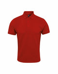 Premier's PR630 is a red polo shirt designed with short sleeves, a collar, and a three-button placket.