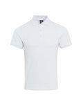 The Premier PR630 is a light blue polo shirt featuring a classic collar and short sleeves, displayed against a white background. It includes a button-up placket with three buttons.