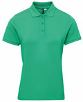 A Premier PR632 green polo shirt, featuring short sleeves and a buttoned collar, set against a plain white background.