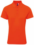 Introducing the Premier PR632: a vibrant orange short-sleeve polo shirt. It features a classic collar and three buttons down the front. Crafted from smooth, slightly glossy fabric that resembles polyester, this stylish shirt is showcased on a white background.