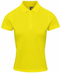 Introducing the PR632 by Premier: a vibrant yellow polo shirt featuring short sleeves and a classic collared design. It includes a three-button placket and is elegantly showcased against a simple white backdrop.