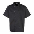 The PR664 by Premier is a black short-sleeve chef jacket featuring a double-breasted front, silver buttons, and a mandarin collar.