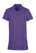 The Premier PR682 is a purple short-sleeved tunic featuring an asymmetrical front design with a row of six buttons. Its smooth fabric and Mandarin-style collar enhance its sleek appearance.