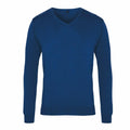 A Premier long-sleeved blue V-neck sweater, product name PR694, is showcased against a white background. The sweater features a soft fabric and embodies a simple, classic design.