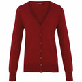 Premier's PR697 is a red V-neck cardigan featuring long sleeves and a button-up front.