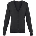 A black, long-sleeved cardigan from Premier's PR697 line is displayed against a white background. Featuring a V-neckline and button-up front, this garment includes ribbed cuffs and hem for a simple and classic look.