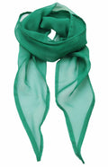 The Premier PR740 is stylishly tied in a loose knot, showcasing its vibrant green, lightweight, and translucent sheer fabric. Its soft edges gracefully form gentle folds for a flowing appearance.
