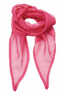 The Premier PR740 is a bright pink chiffon scarf featuring a smooth, sheer texture, elegantly draped in a loop with the ends gracefully hanging down.
