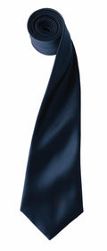 The Premier PR750, a neatly rolled dark blue silk tie with a smooth texture, is unrolled downwards on a plain white background, highlighting its length and sleek appearance.