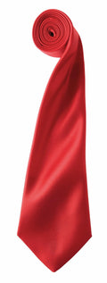 A neatly rolled Premier PR750 silk necktie in red, displayed against a white background.