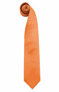 A neatly rolled PR765 necktie from Premier, featuring a vibrant orange color and a smooth, shiny fabric texture.