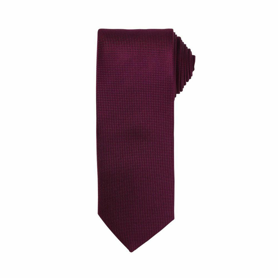 A PR780 necktie from Premier, featuring a folded dark red design with a textured pattern on a white background.