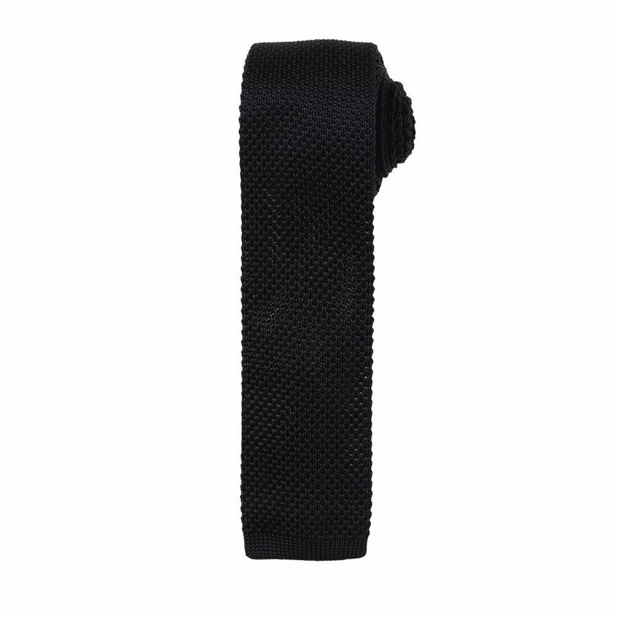 A Premier PR789 black knitted necktie elegantly rolled up on a white background.