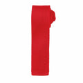 A neatly rolled Premier PR789 knitted necktie in vibrant red, featuring a textured surface and displayed against a plain white background. The tie boasts a unique flat-bottom design, highlighting its modern and stylish appearance.