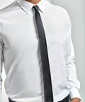 Close-up of a person wearing a white dress shirt paired with a black tie, against a light background. The shirt is the Premier PR793.